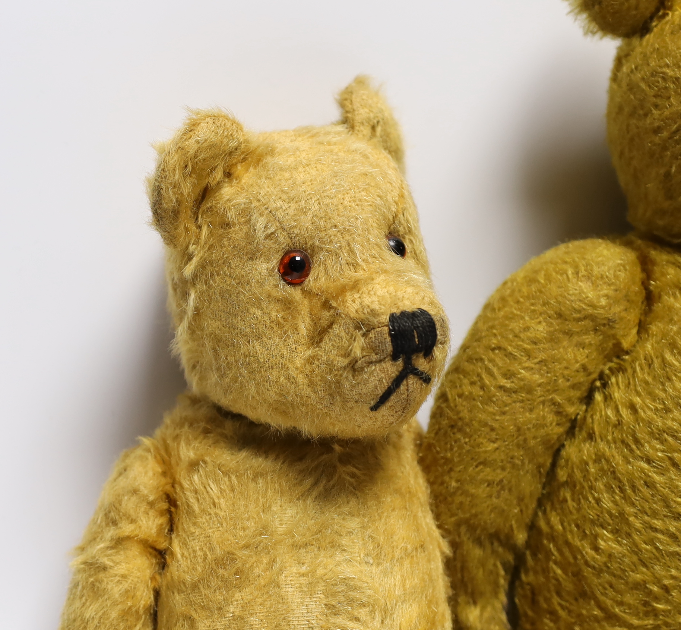 A 1930's German bear with 'set in' ears and a 1950's English Chiltern bear (2)